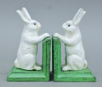A pair of cast iron rabbit bookends. 13 cm high.