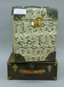 Two vintage cases. The largest 40 cm high.