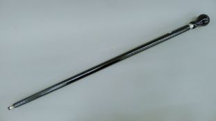 A Porche walking stick. 94 cm long.