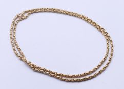 A 9 ct gold necklace. 76 cm long. 21.2 grammes.