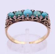 An 18 ct gold, turquoise and diamond five-stone ring. Ring size Q.
