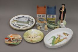 A quantity of various porcelain, including Wade and a Royal Doulton figurine 'The Graduate'.