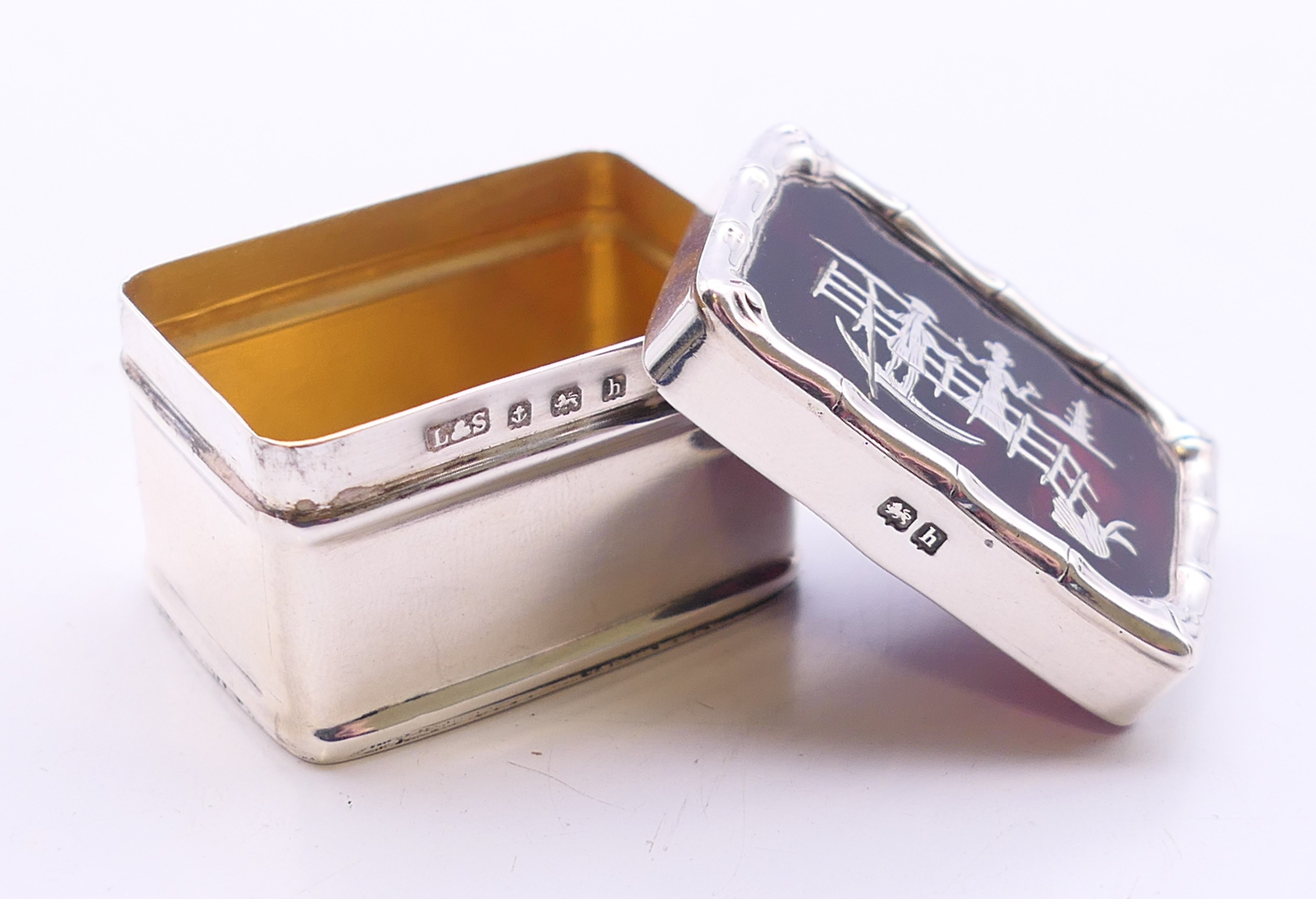 An Edwardian silver pill box, the lid with inlaid silver design on tortoiseshell, - Image 3 of 4