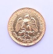 A 1945 Dos Pesos gold coin. 1.7 grammes.