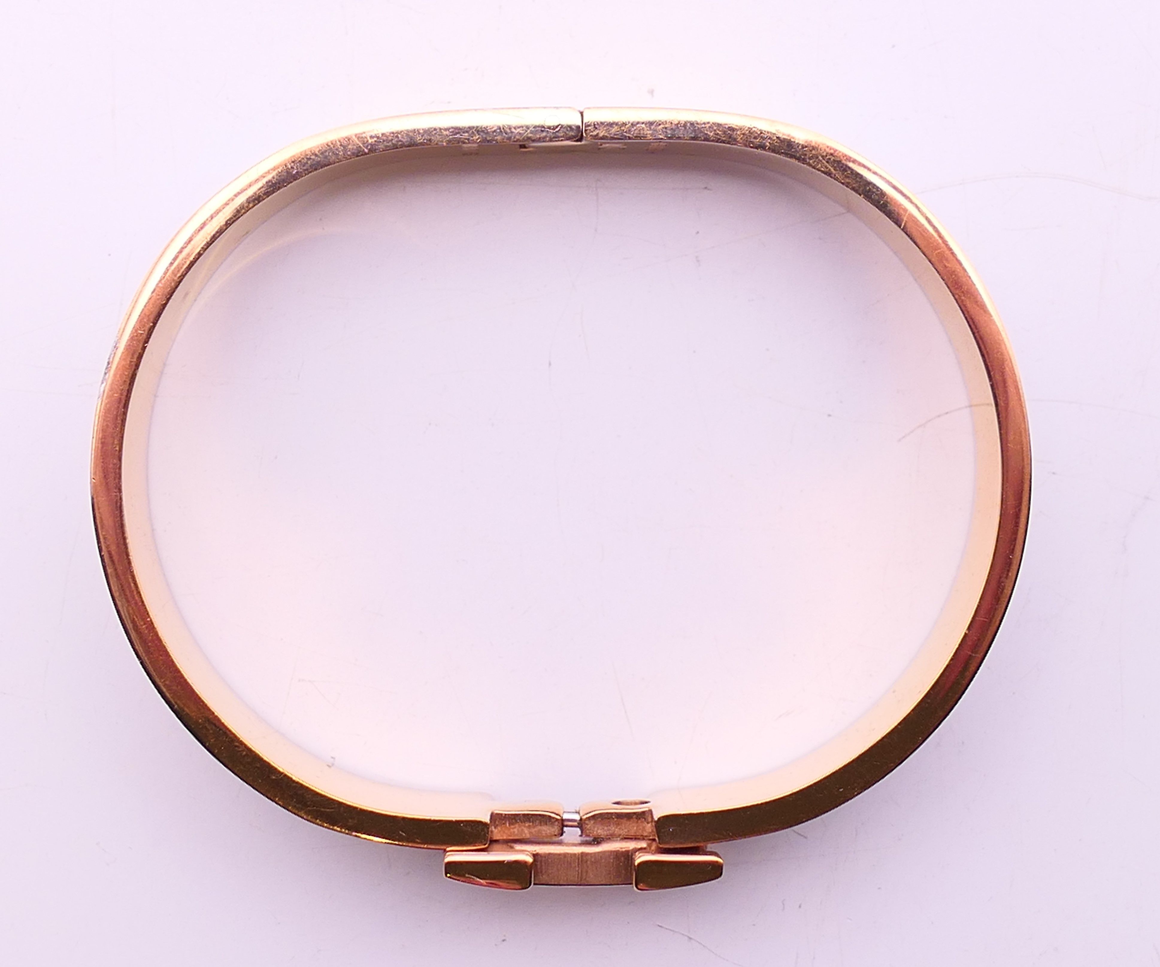 A Hermes Paris white enamel gold plated Clic H bracelet, in a Hermes box. 6. - Image 4 of 5