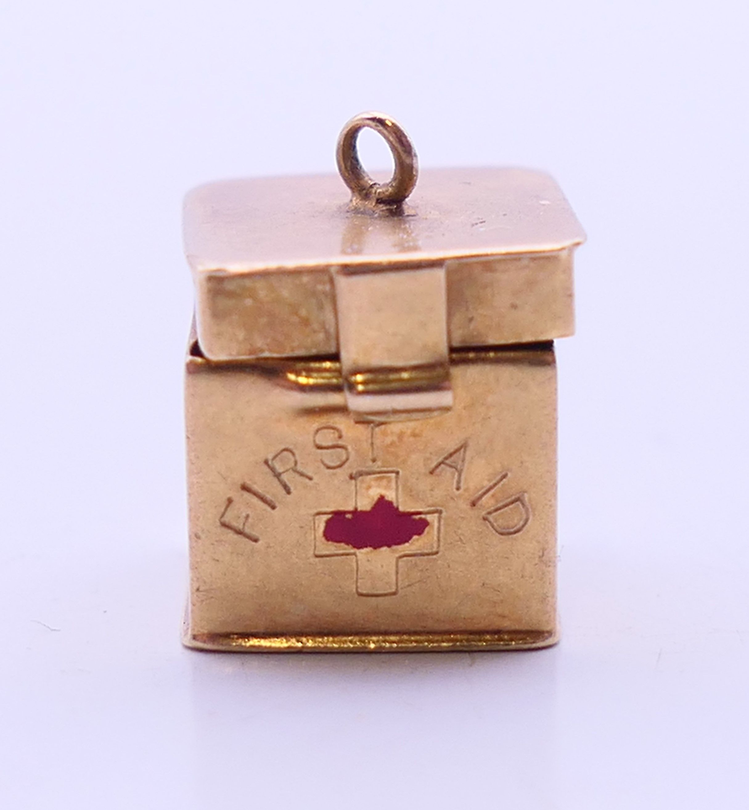 Three 9 ct gold charms to include: a 'first aid' box, - Image 12 of 14