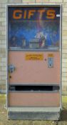 A vintage fairground prize machine. 65 cm wide x 134 cm high.
