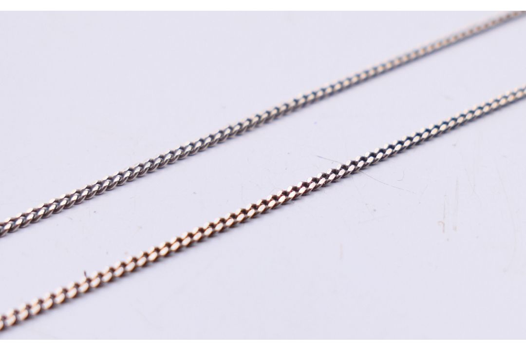 A silver and amber pendant on a silver chain. Pendant 3.5 cm high, chain 41 cm long. - Image 7 of 7