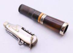 A mother-of-pearl handled penknife and a cased silver mounted cheroot holder. The former 5.
