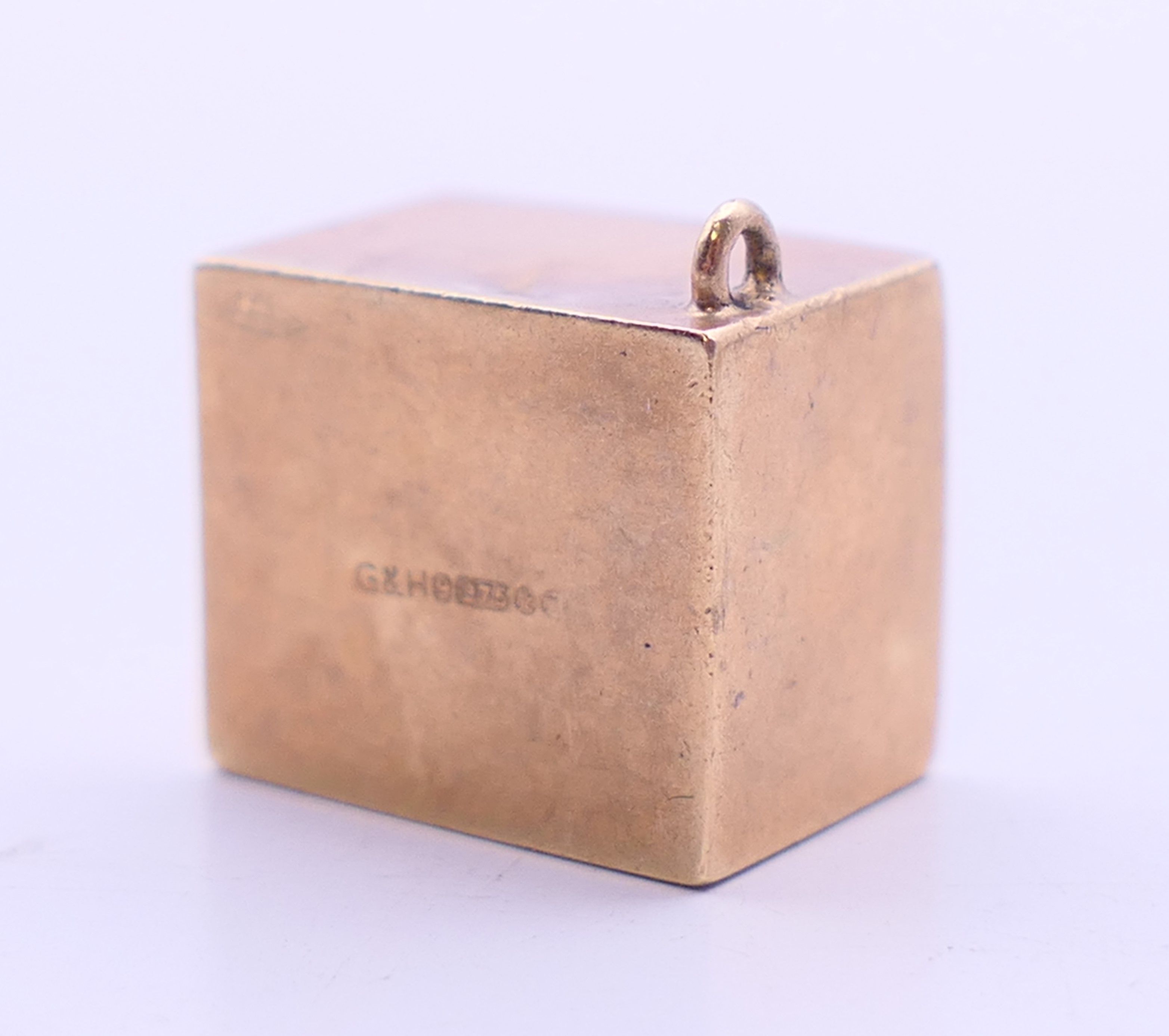 Three 9 ct gold charms to include: a 'first aid' box, - Image 9 of 14