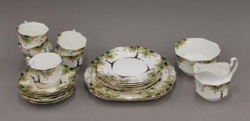 A Fenton June pattern tea set comprising two bread plates, six side plates, six cups and saucers,