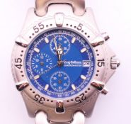 A Krug-Baumen chronomaster gentleman's wristwatch, model number 1915CMM, boxed. 4.25 cm wide.