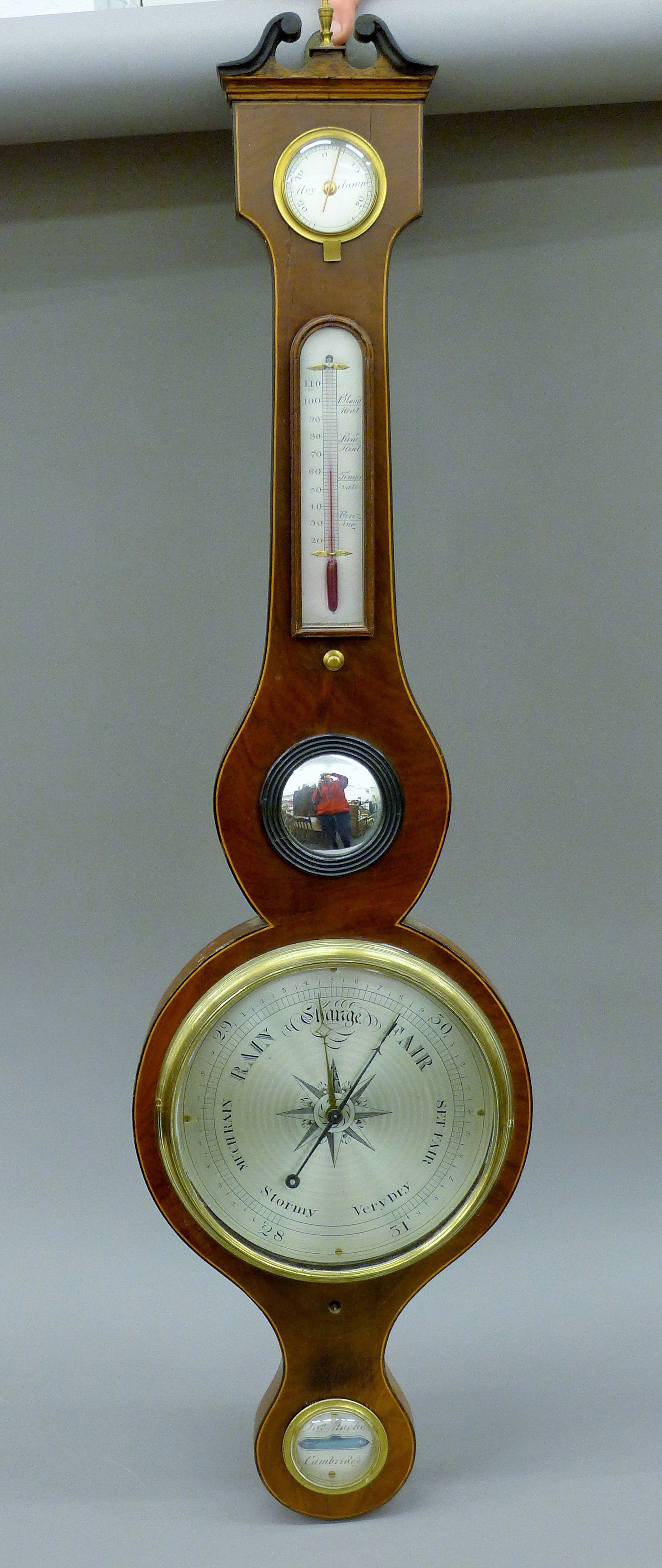 A 19th century mahogany banjo barometer inscribed 'Jos Mache, Cambridge'. 99 cm high.