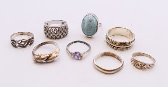 Eight silver rings. Various sizes.