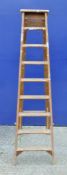 A vintage pine step ladder. 208 cm high.