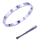 A Cartier 18 K white gold and diamond Love bangle, marked Cartier, Au750,