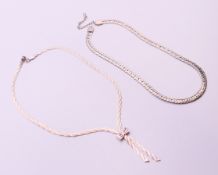 Two silver necklaces. 46 cm long and 40 cm long respectively.