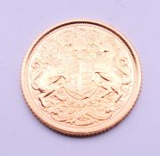 A 2022 King Charles III commemorative gold half sovereign, in presentation box.