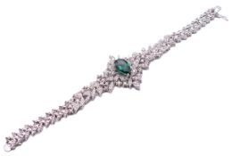 An 18 ct white gold, diamond and tourmaline bracelet. 16 cm long. 29.3 grammes total weight.