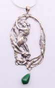 A silver and jade Art Nouveau-style girl pendant on chain. The pendant 10 cm high.