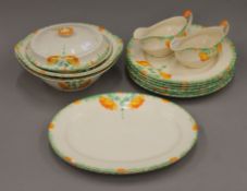 An Art Deco dinner service. The tureens 25 cm wide.