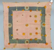 A Middle Eastern applique wall hanging. 81 x 81 cm.
