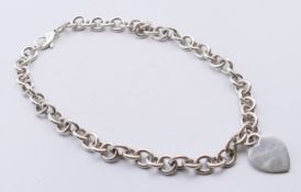 A Tiffany & Co silver hallmarked heart tag chain link necklace in Tiffany box. 36 cm long.