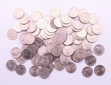 A collection of approximately 100 USA quarter dollar coins.