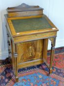 A Victorian inlaid rosewood Davenport. 53 cm wide.