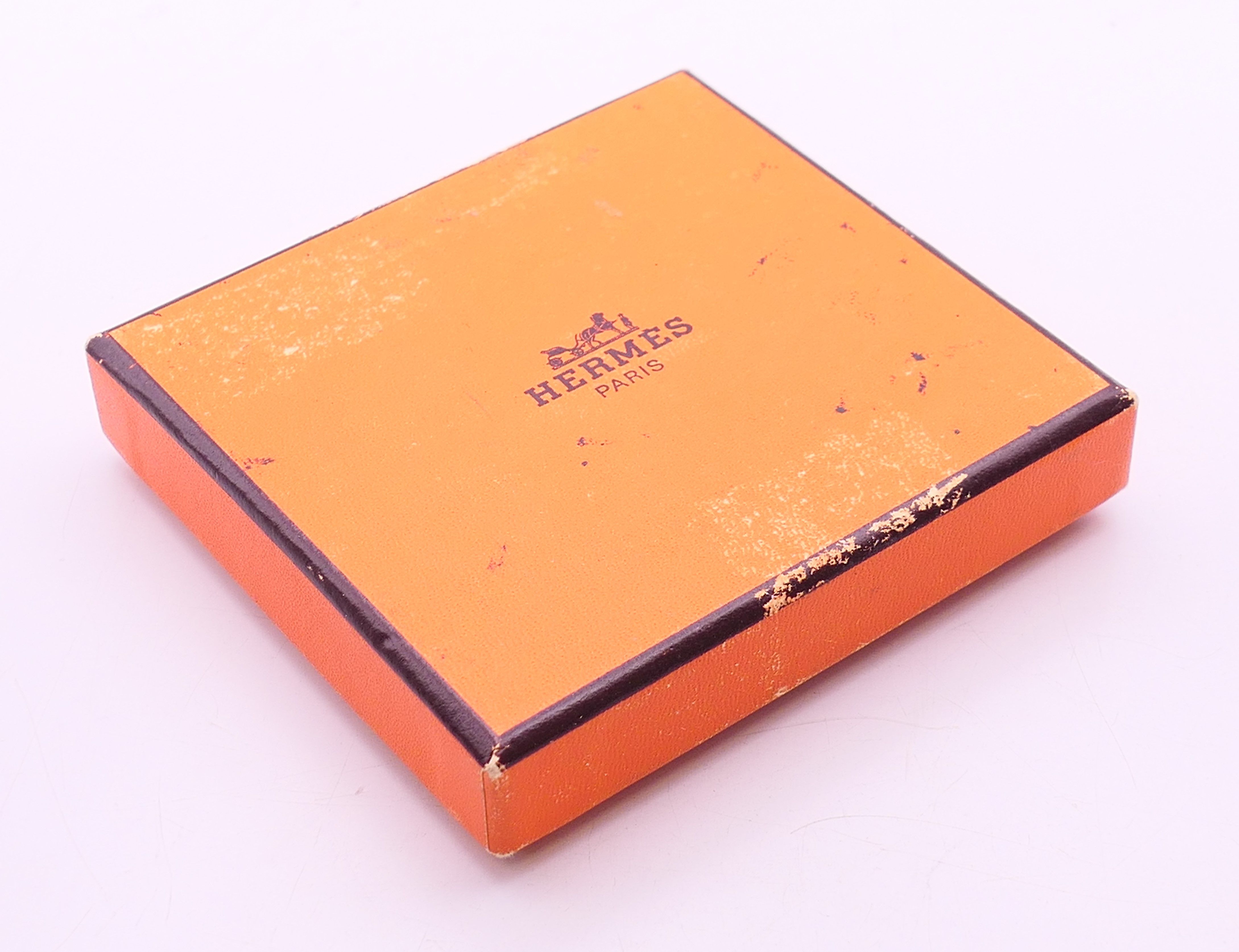 A Hermes Paris white enamel gold plated Clic H bracelet, in a Hermes box. 6. - Image 5 of 5