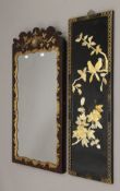 A gilt-heightened wall glass and an Oriental plaque. The former 47.5 x 90 cm.