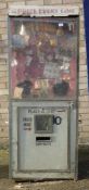 A vintage fairground prize machine. 62 cm wide and 160 cm high.