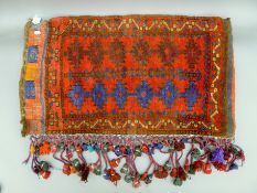 An antique Middle Eastern bag face. 58 x 95 cm.