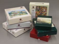 A collection of boxed Wentworth wooden jigsaw puzzles. The largest 23 cm wide.