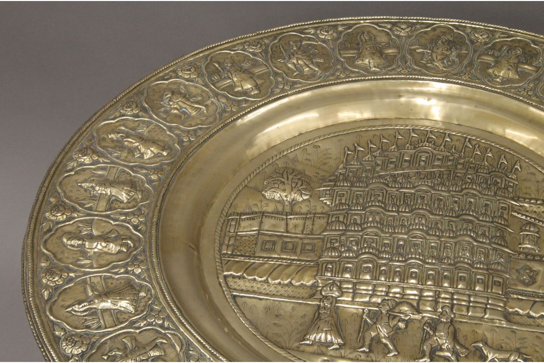 An Eastern brass-topped folding table. 75 cm diameter. - Image 2 of 5