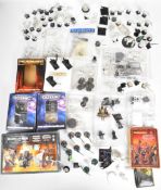 A collection of Games Workshop Warhammer and Warhammer 40K white metal miniatures to include Undead,