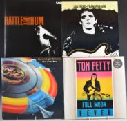 Approximately 160 albums including U2, Dire Straits, Led Zeppelin, Hawkwind, Genesis, Def Leppard,