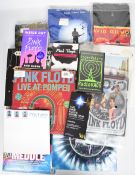 A collection of Pink Floyd related books, magazines and merchandise including three David Gilmour