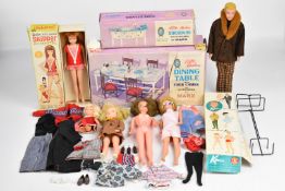 A collection of vintage Barbie and similar fashion dolls to include Midge, Skipper, Patch and Ken,