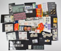 Large collection of collectible stamp booklets and sets, various denominations including 50p, £1, £