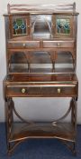 Arts & Crafts Liberty, George Walton or similar bureau with wavy fretwork decoration, leaded glass