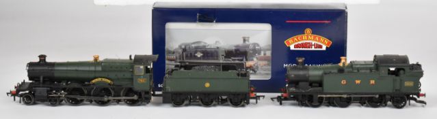 Two Bachmann 00 gauge GWR model railway locomotives comprising 56XX tank and Dunley Manor, the