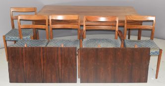Retro mid century modern rosewood extending dining table and five (4+1) chairs, the table having two