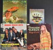 Eighteen albums including The Beatles plus Magical Mystery Tour EP