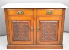 Late 19th or early 20th carved walnut marble topped sideboard with two drawers above cupboards, W107
