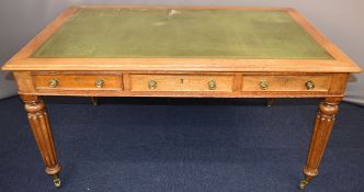 Victorian oak, leather inset library table or partner's desk with tooled and gilt leather inset top,