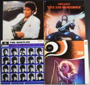 Approximately 50 albums including The Beatles