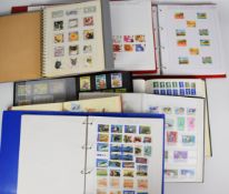 A mint and used GB and world stamp collection in various albums / stockbooks
