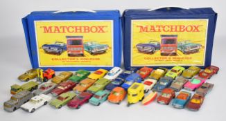 Two Matchbox 24 car collector's mini-cases, both with plastic inner trays and a selection of diecast