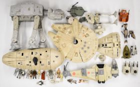 A collection of vintage Star Wars figures and vehicles to include AT-AT, Scout Walker, B-Wing